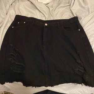 Black ripped denim skirt new never worn